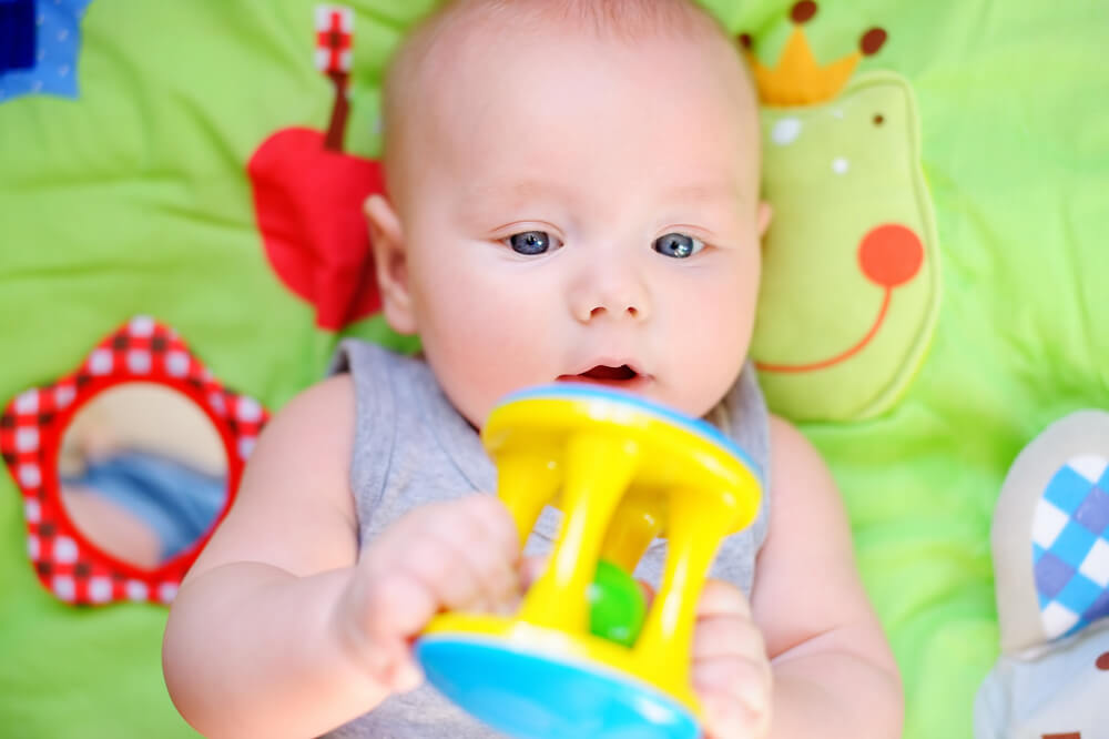 When Does Baby Grab Toys? | theBabyCelebration.com